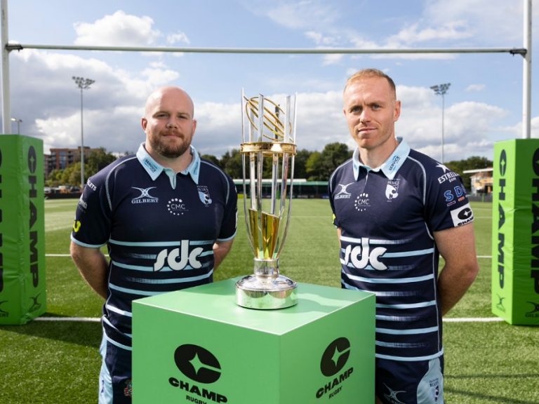 Bedford Blues' Jamie Jack (left) and captain Alex Day with the Champ Rugby trophy in October 2025