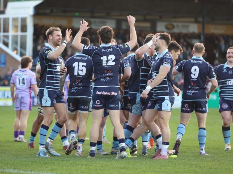 Bedford Blues celebrate a try against Worcester Warriors at Goldington Road in December 2025