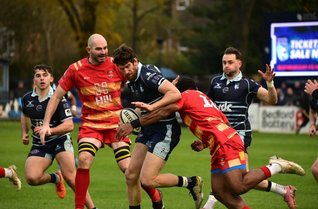 Michael Le Bourgeois evades a tackle against Cambridge at Goldington Road in December 2025