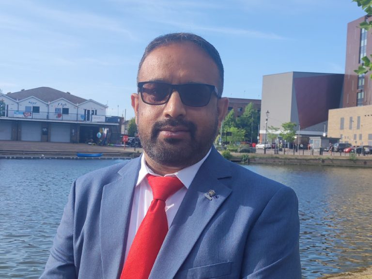 Cllr Abu Sultan pictured alongside the River Great Ouse in Bedford.