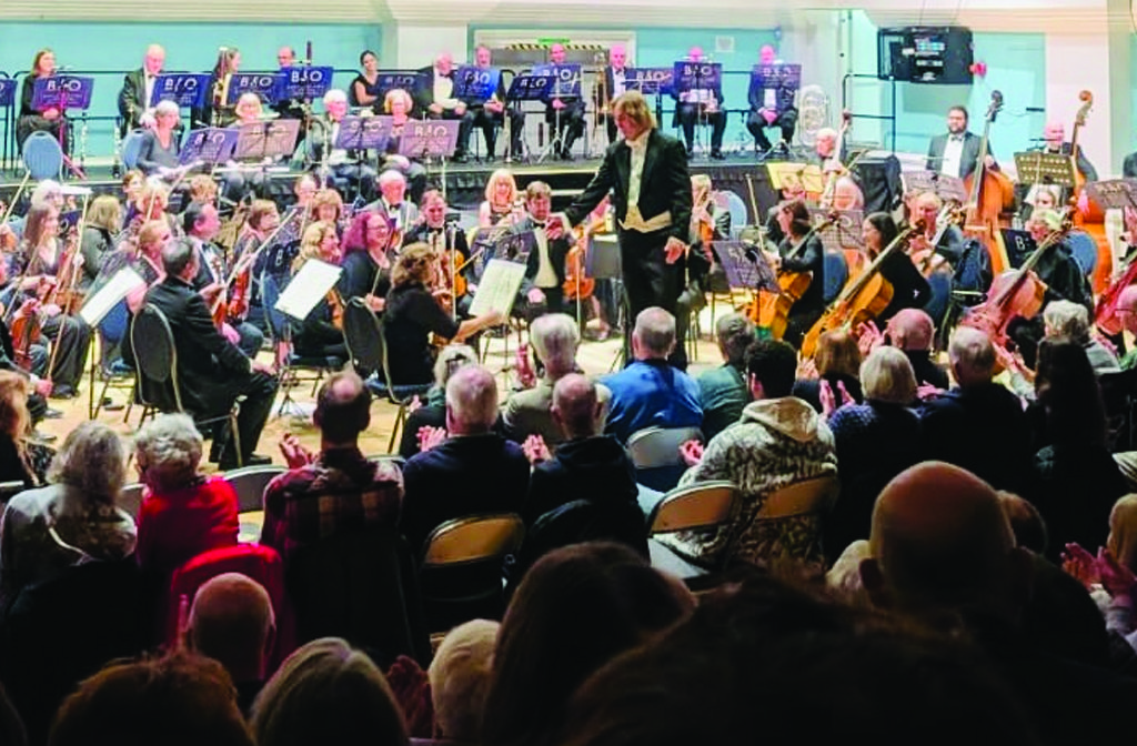 Conductor Bjorn Bantock takes centre stage. Image- Bedfordshire Symphony Orchestra
