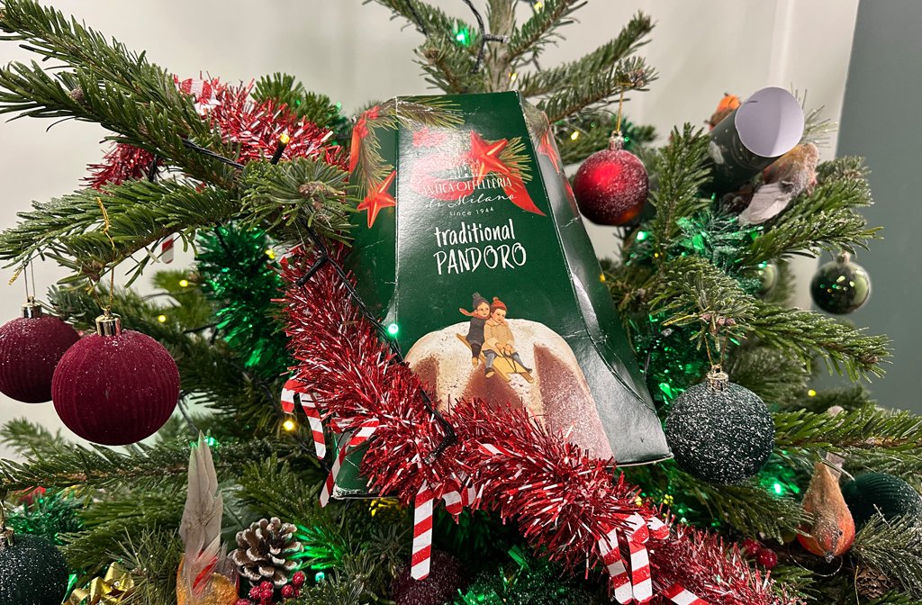 The panettone from Damiano Hair's TikTok video nestled in a Christmas tree