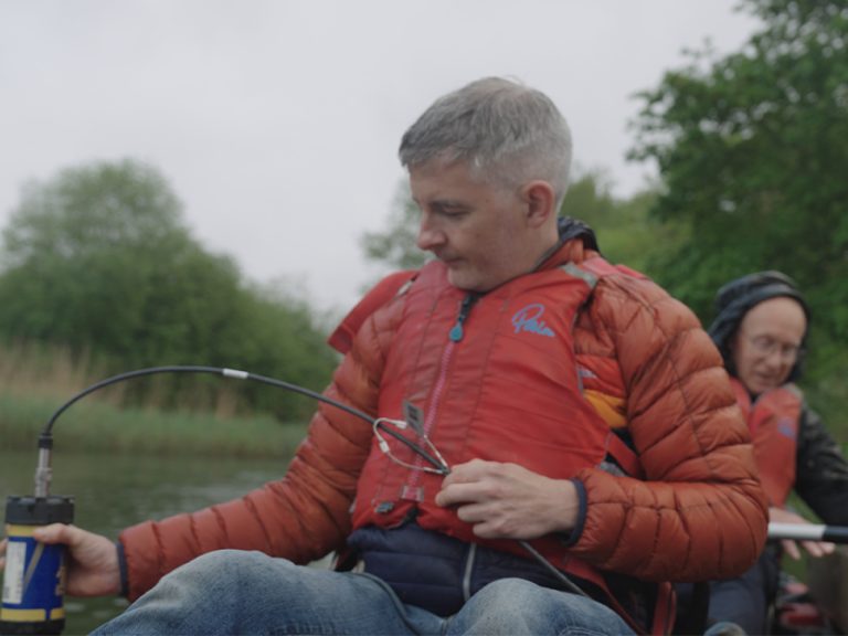 Ed Robinson of Wells & Co helping to test the quality of water in the River Great Ouse Image BedsGOVET