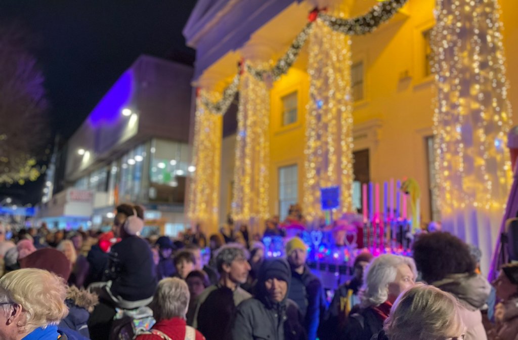 Harpur Suite adorned with Christmas lights as festive crowds look on. Image: Bedford Borough Council