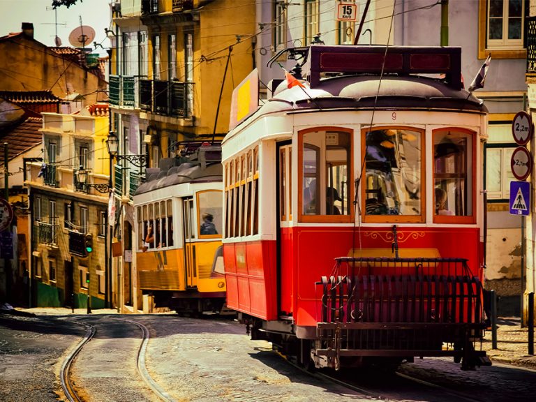 Historical Vintage Tram on Alfama district street in Lisbon city in Portugal Image Michał Ludwiczak Pexels