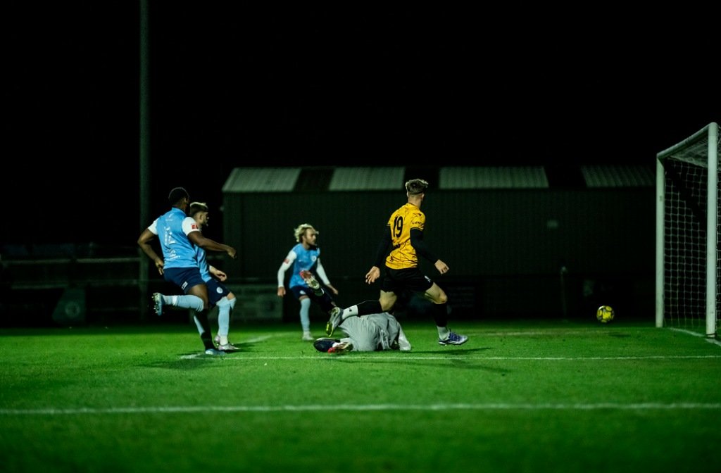 Josh Allen pokes the ball past the AFC Dunstable goalkeeper in the Bedfordshire Cup in October 2025