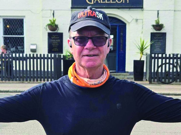 Proud podcast host, Ken Parsons, wearing an Ultra5k cap