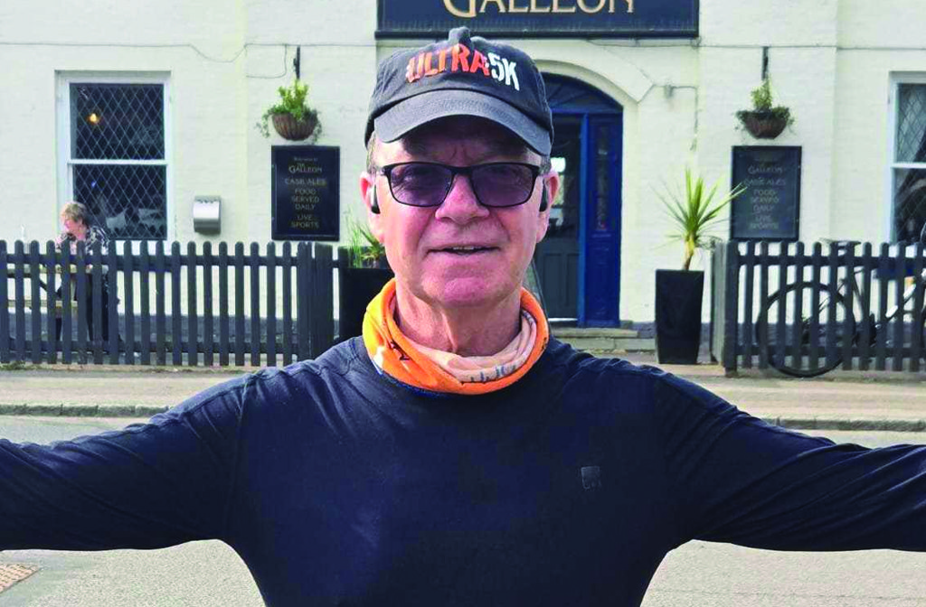 Proud podcast host, Ken Parsons, wearing an Ultra5k cap