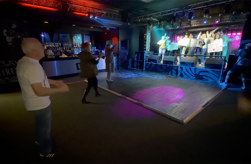 Martin Grennan looks on as Tom Grennan fans perform for a special fan video. Image: Bedford Clanger