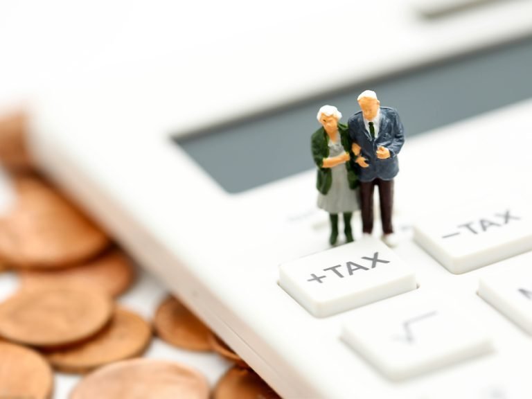 Miniature people - Couple oldman standing with Calculator, business, tax Image ViewFinder nilsophon shutterstock