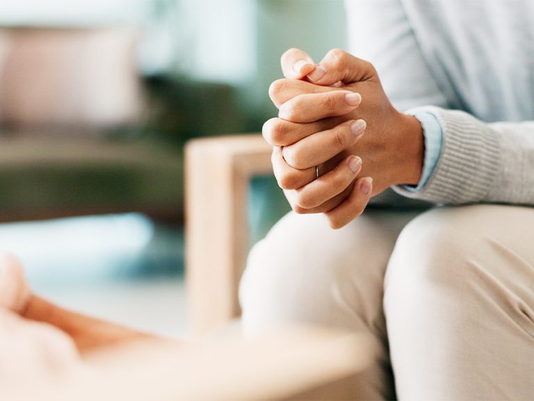 Psychology, mental health or woman hands with psychologist in consultation counseling therapy Image PeopleImages Shutterstock