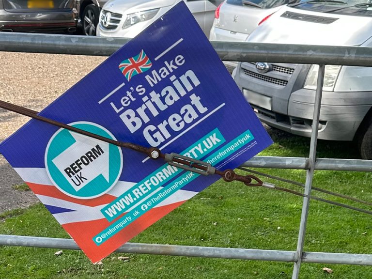 Reform UK banner attached to a gate Image LDRS
