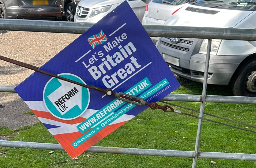 Reform UK banner attached to a gate Image LDRS