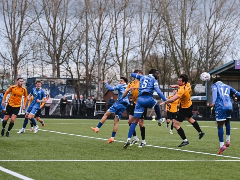 Zanda Siziba directs a header goalwards for Bedford Town against Southport