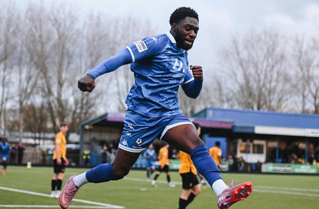 Zanda Siziba celebrates a goal for Bedford Town