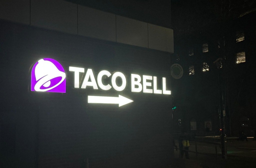 The neon sign of Taco Bell on Riverside Square in November 2025