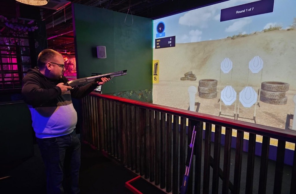 Bedford Independent's Sport Editor working on his target practice at Putt Putt Noodle's new shooting simulator in October 2025