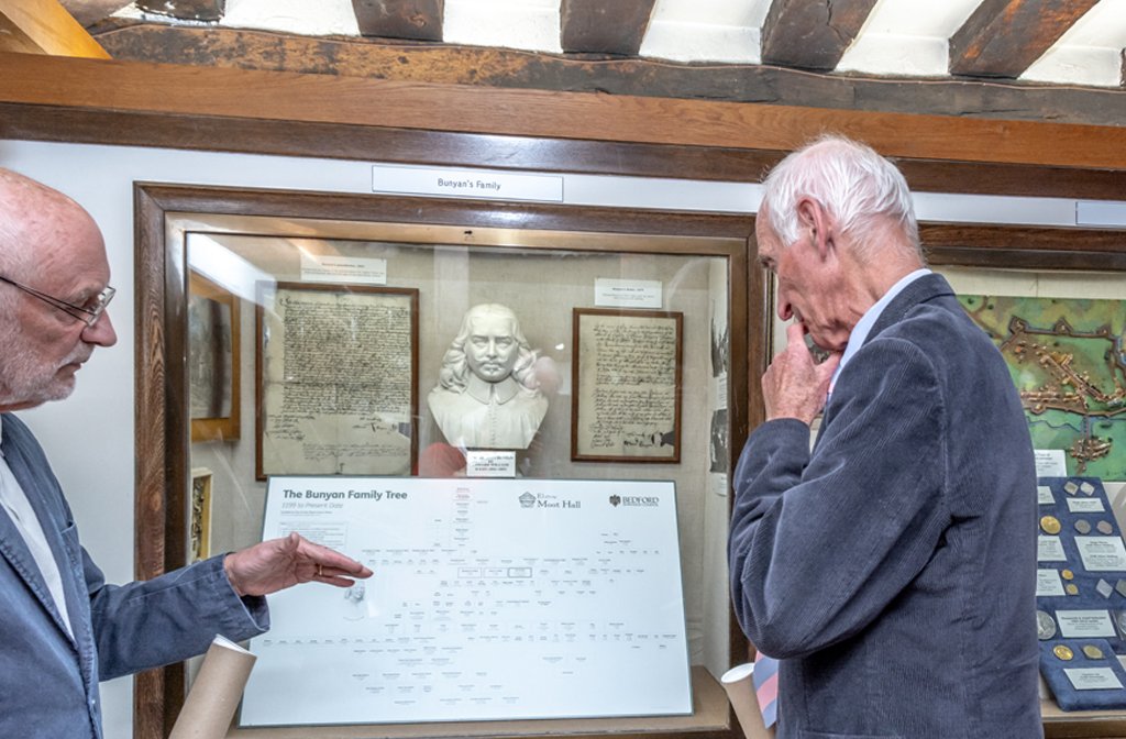 Peter (left) and Richard Brown looking at Moot's display of the family tree, just after they unveiled it