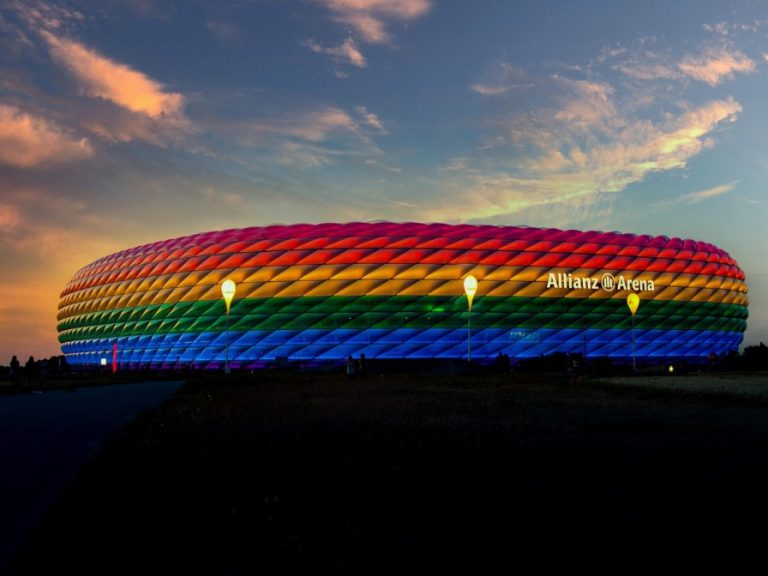 Germany's Allianz Arena lit up in the colours of the rainbow. Image: Designer Point / Pixabay