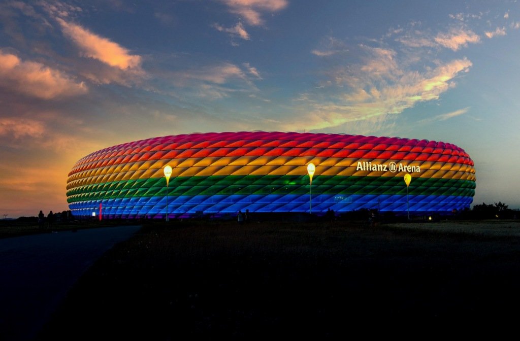 Germany's Allianz Arena lit up in the colours of the rainbow. Image: Designer Point / Pixabay