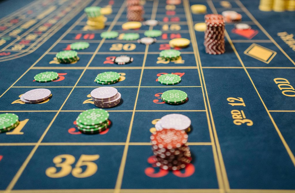 Gambling chips on a casino roulette table Image Pavel Danilyuk Pexels