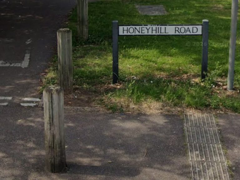 Honey Hill Road street sign, Queen's Park Image Google 2026 Image capture July 2024
