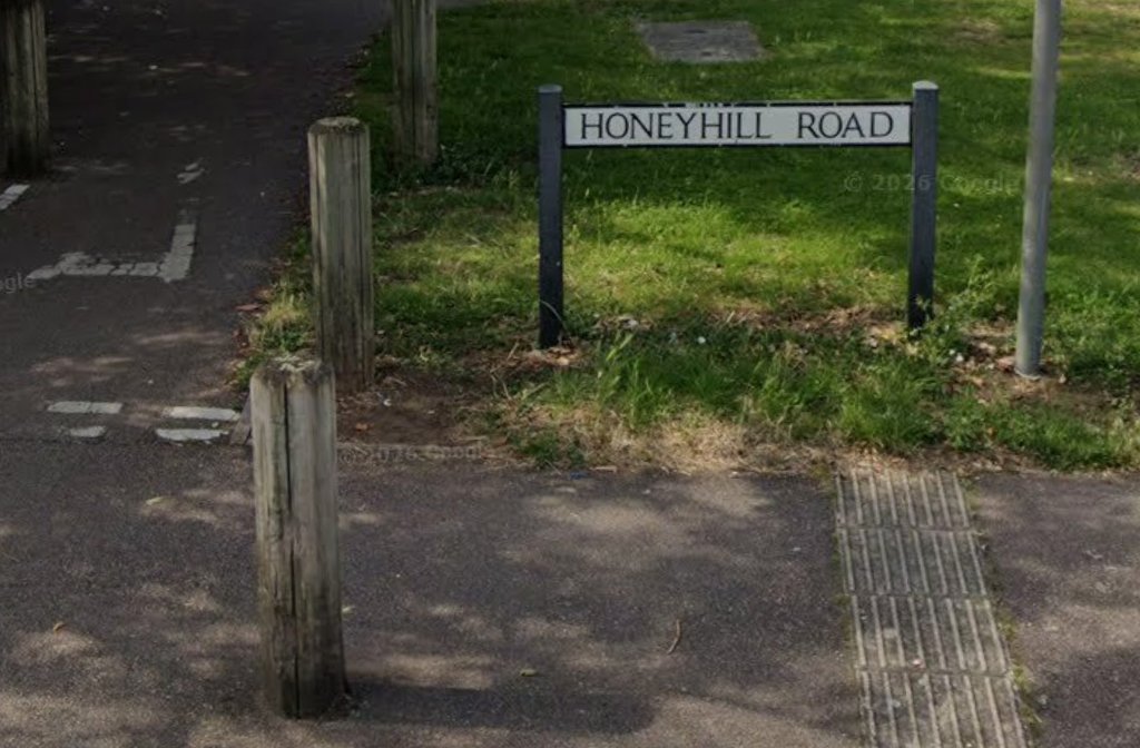Honey Hill Road street sign, Queen's Park Image Google 2026 Image capture July 2024