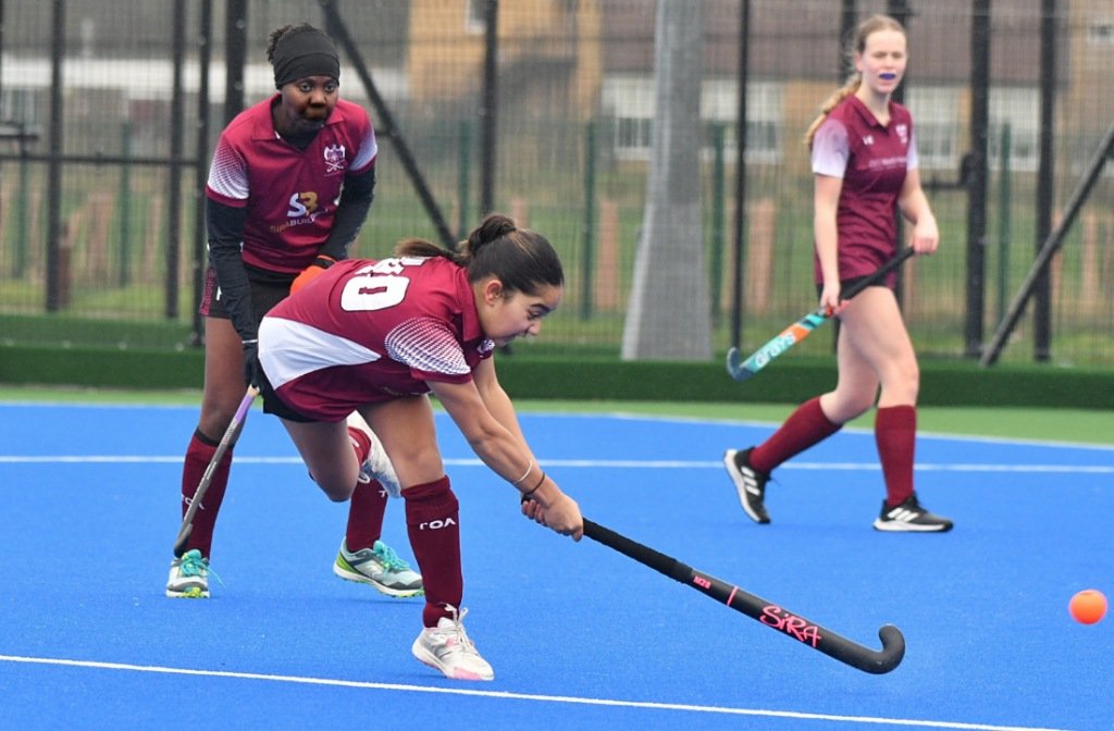 Bedford Hockey Club's, Manpriya Sira strikes on goal at Chester Road