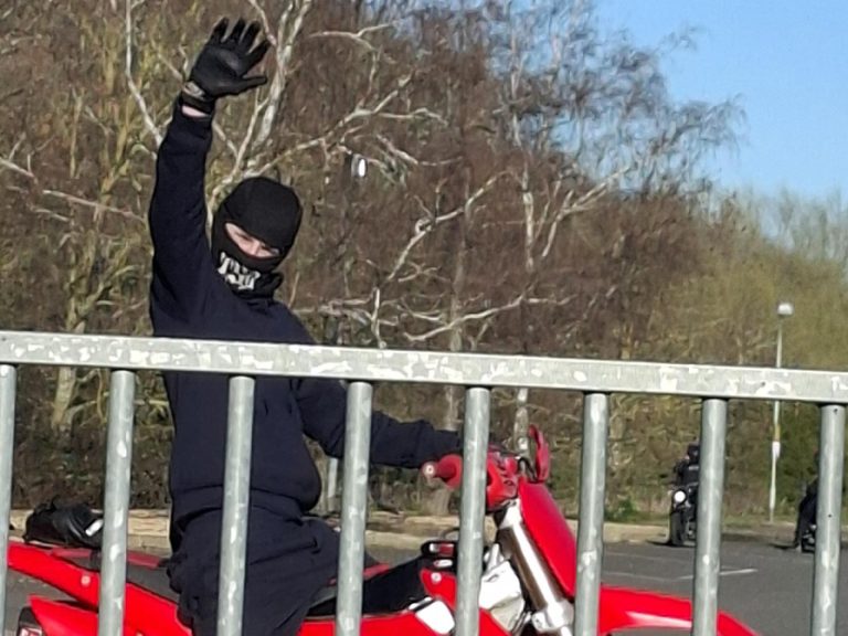 Biker in a balaclava in the former Oasis Beach Pool car park. Image: Bedfordshire Police