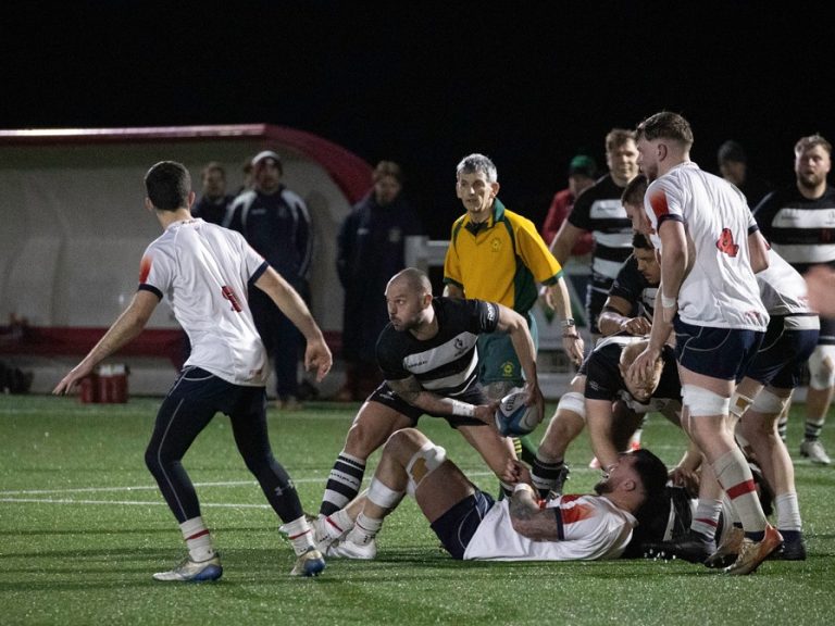 Bedford Athletic scrum half passing from the back of a ruck against Wellingborough