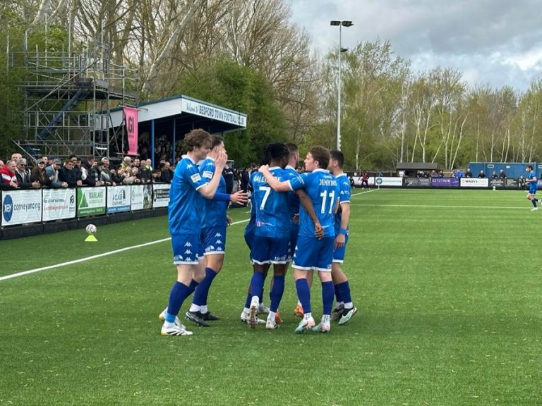 Bedford Town celebrate a goal against Leamington at The Eyrie in April 2026