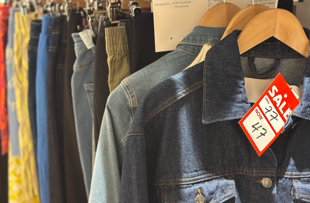 Clothes on the closing down sale rail at Boutique Planet