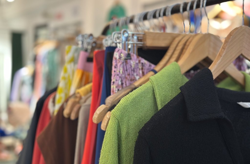 Clothes on the closing down sale rail at Boutique Planet