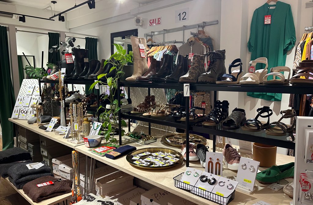 Accessories and shoes on display at Boutique Planet