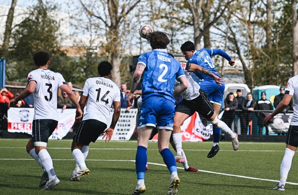 Ryan Doherty scored a header for Bedford Town against Hereford at The Eyrie