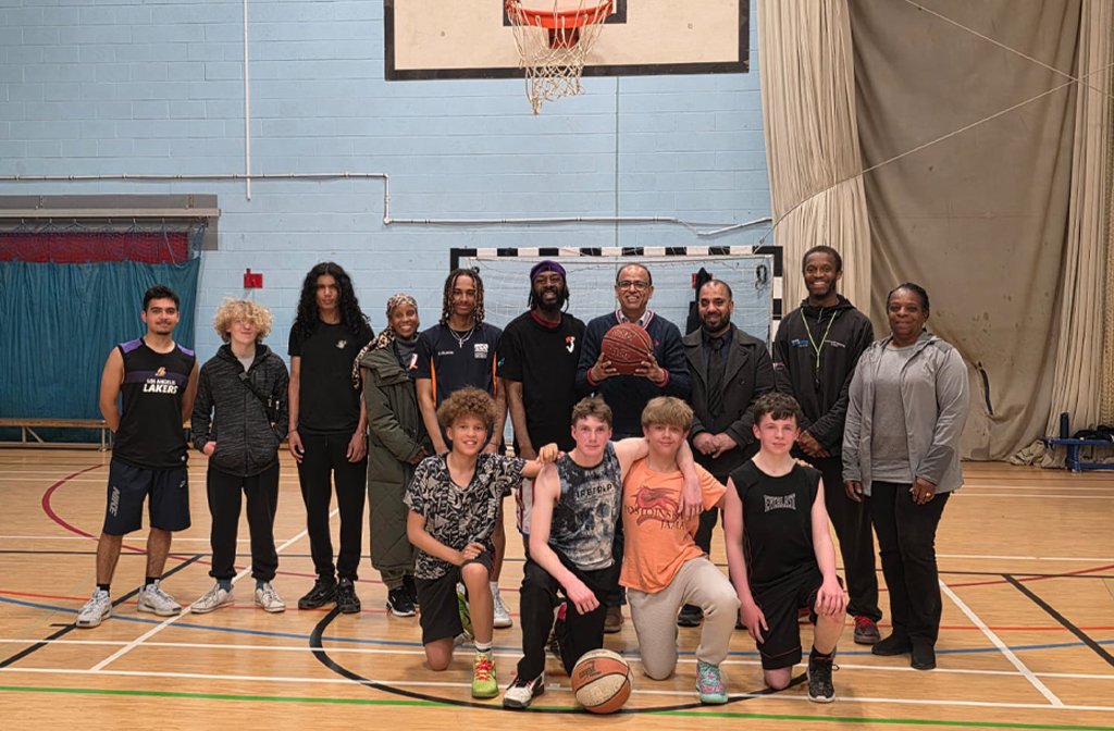 Faith in Queen's Park trustees, coaches and service users with Mohammad Yasin MP. Image: the office of Mohammad Yasin MP