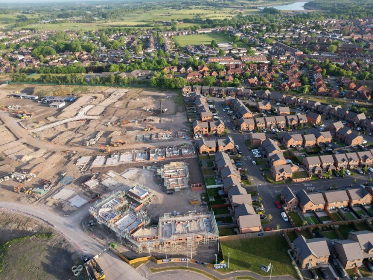 New build homes in England 2025/Aerial view of UK housing estate being built