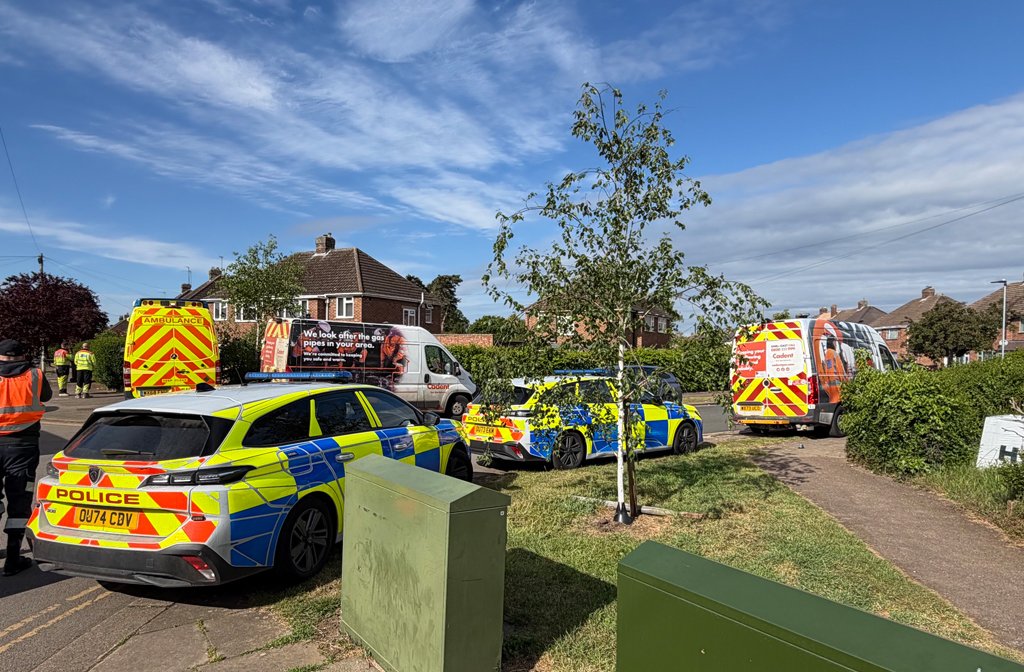 Police cars and gas vans at Aylesbury Road in Bedford following an incident