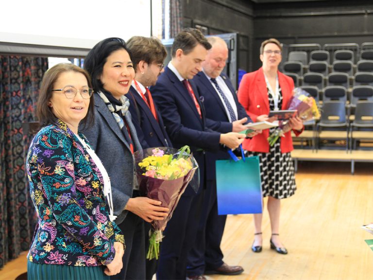 Representatives of the Polish Embassy being welcomed to St Thomas More School Image STM