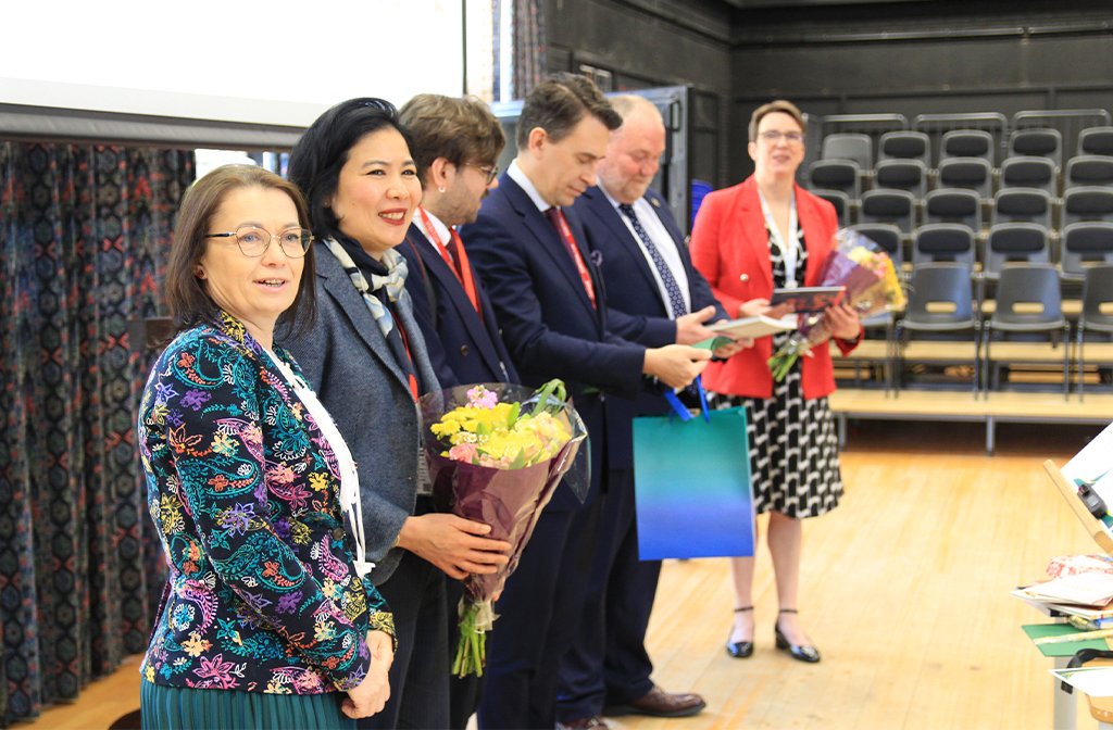 Representatives of the Polish Embassy being welcomed to St Thomas More School Image STM