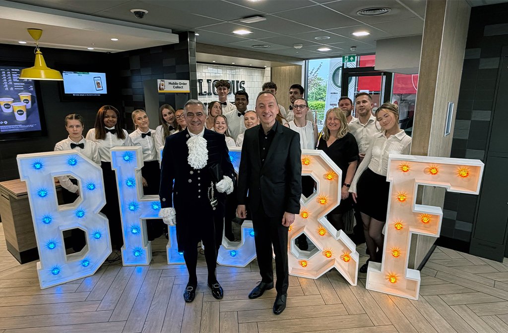 (l-r) Ismail Anilmis, High Sherrif of Bedfordshire and Claude Abi-Gerges owner of McDonald's Elms Parc, with the McDonald’s team