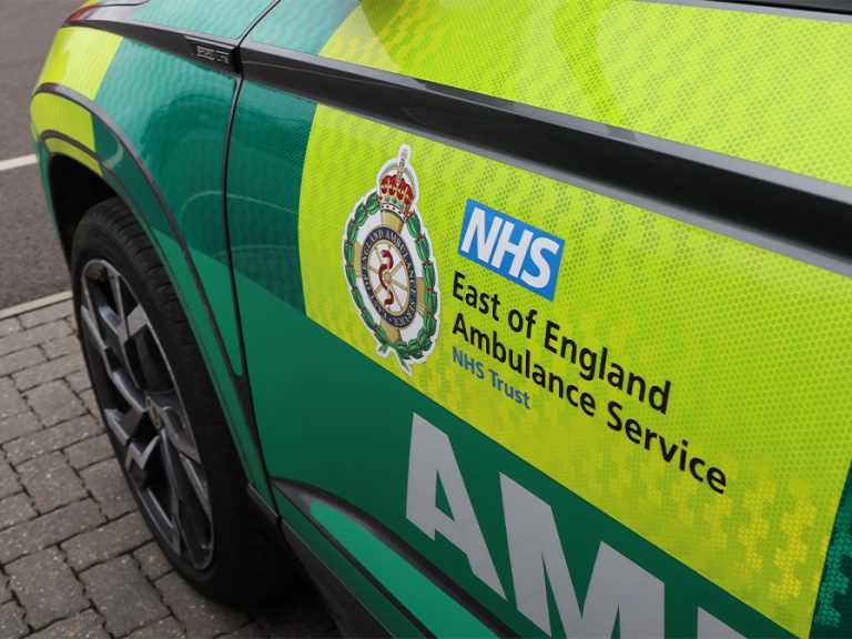 The door of an East of England ambulance emergency response vehicle showing the East of England Ambulance service Trust logo. Image: EEAST.