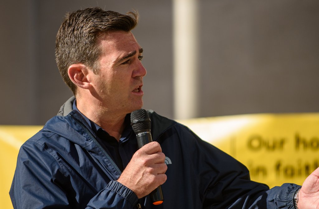 A photo of Andy Burnham, former Mayor of Manchester, speaking to a crowd of people