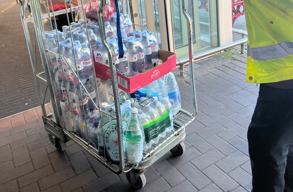 Bottles of water donated by Kempston Sainsbury's ina. cage trolley being picked up by 1st Wixams Scouts volunteers to help support relief of passengers and emergency responders after the Bedford Train Collision on 19 June 2026. Image: 1st Wixams Scouts