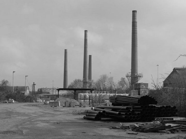 Stewartby Brickworks close after over 100 years of brick making in the area. Four Chimneys in the distance in this black and White photo with kilns in the foreground were given Grade 2 listed status. Image: Stewartby and Kempston Hardwick Parish Council.