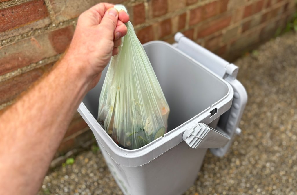 Food waste being put into the outdoor caddy. Image Bedford Borough Council