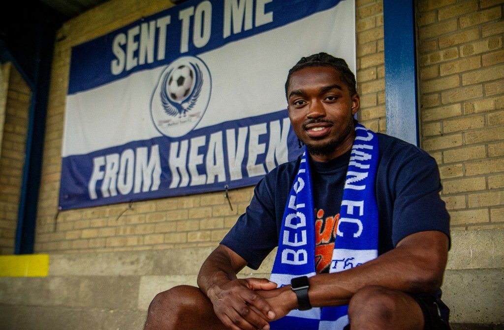 New Bedford Town player, Peter Abimbola sitting on the steps at The Eyrie