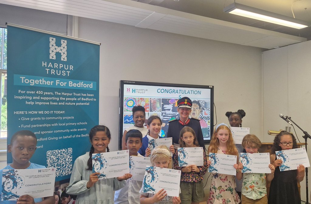 Primary age winners of the Harpur Trust art competition with the Lord Lieutenant Susan Lousada.