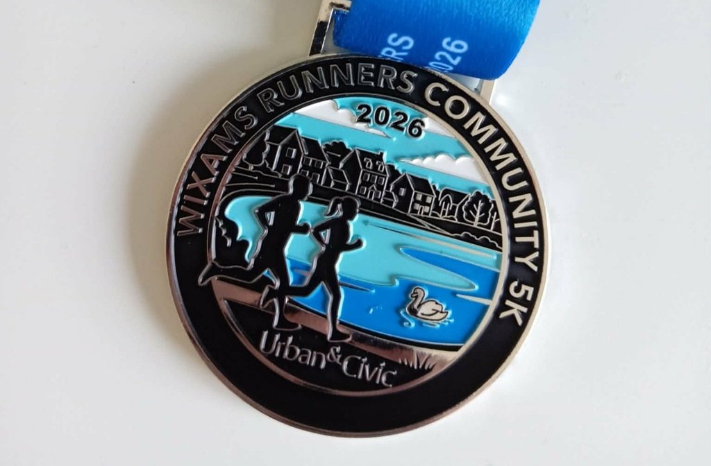 The 5k community run commemorative medal from May 2026