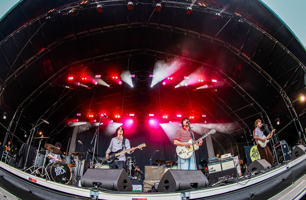A fish-eye lens photo of Manchester four-piece Arkayla supporting Paul Weller at Bedford Summer Sessions 2026.